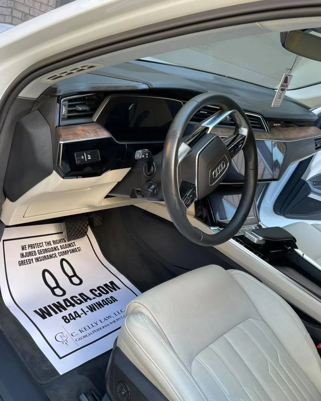 Luxury car interior receiving a professional deep clean and conditioning treatment