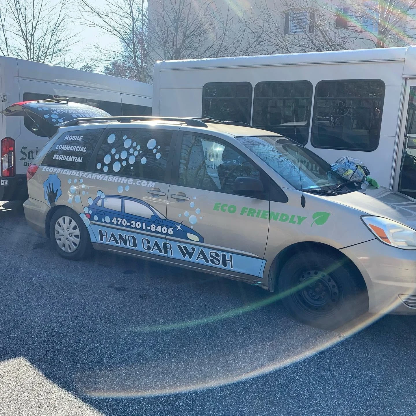 Mobile auto detailing service vehicle parked at a customer location in Atlanta