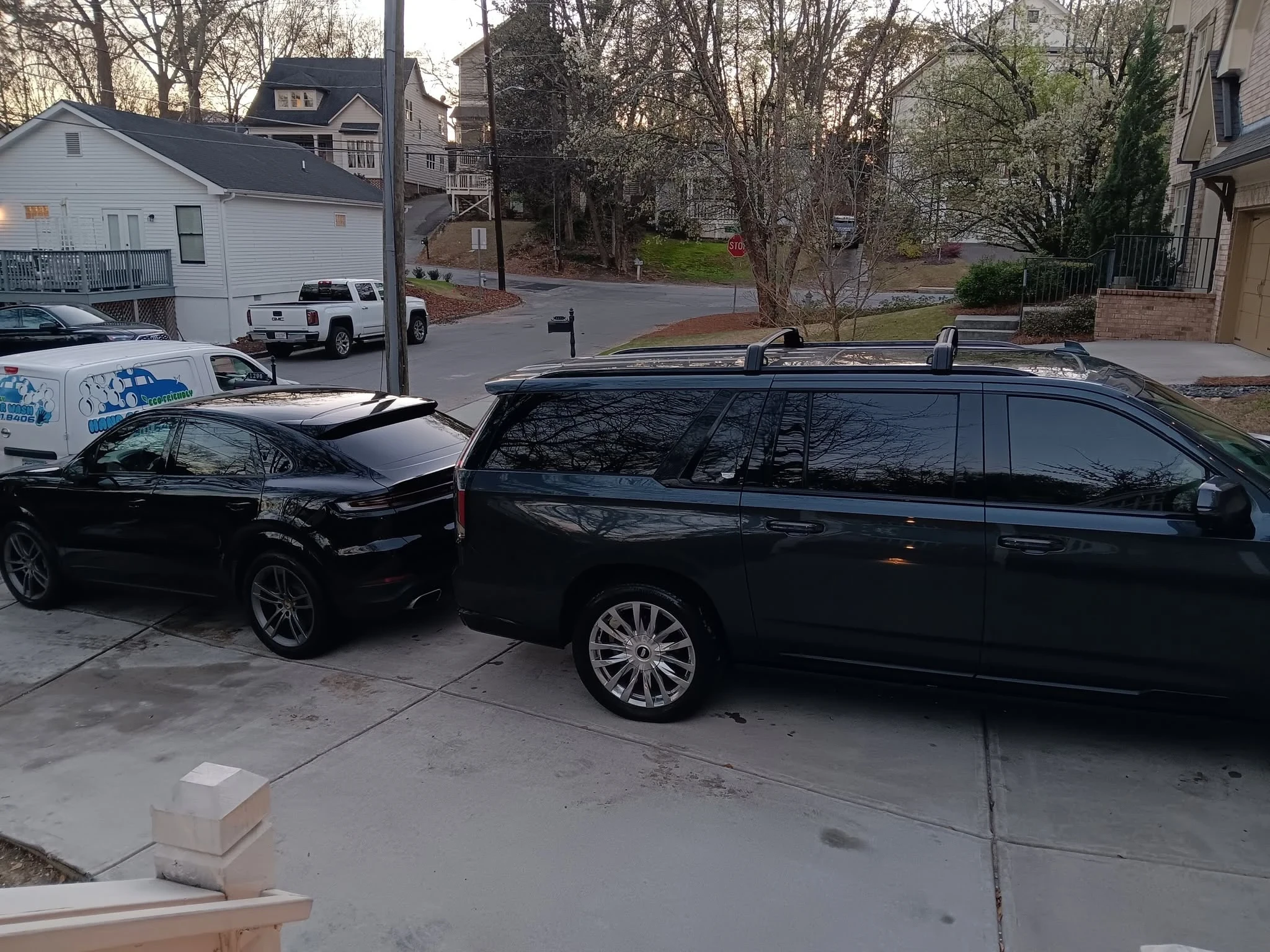 Multiple vehicles lined up for mobile detailing service