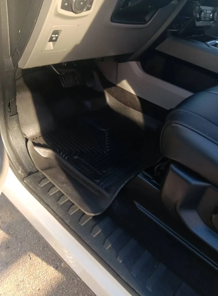 Truck front passenger area cleaned and detailed including door panels and seat